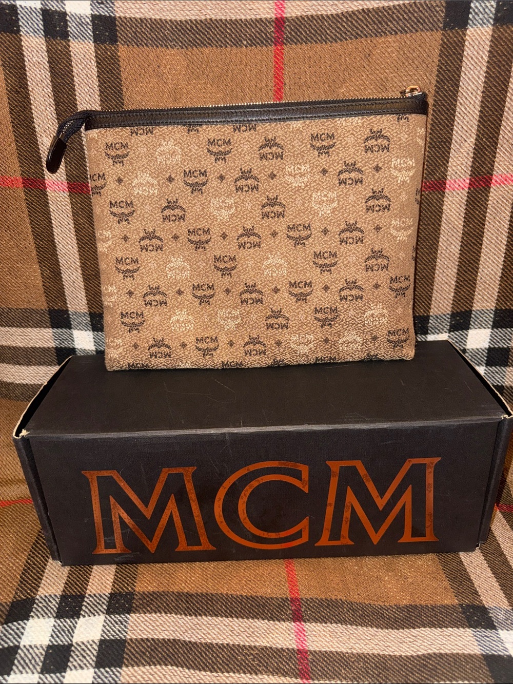 MCM  Authentic Tan Monogram Pouch